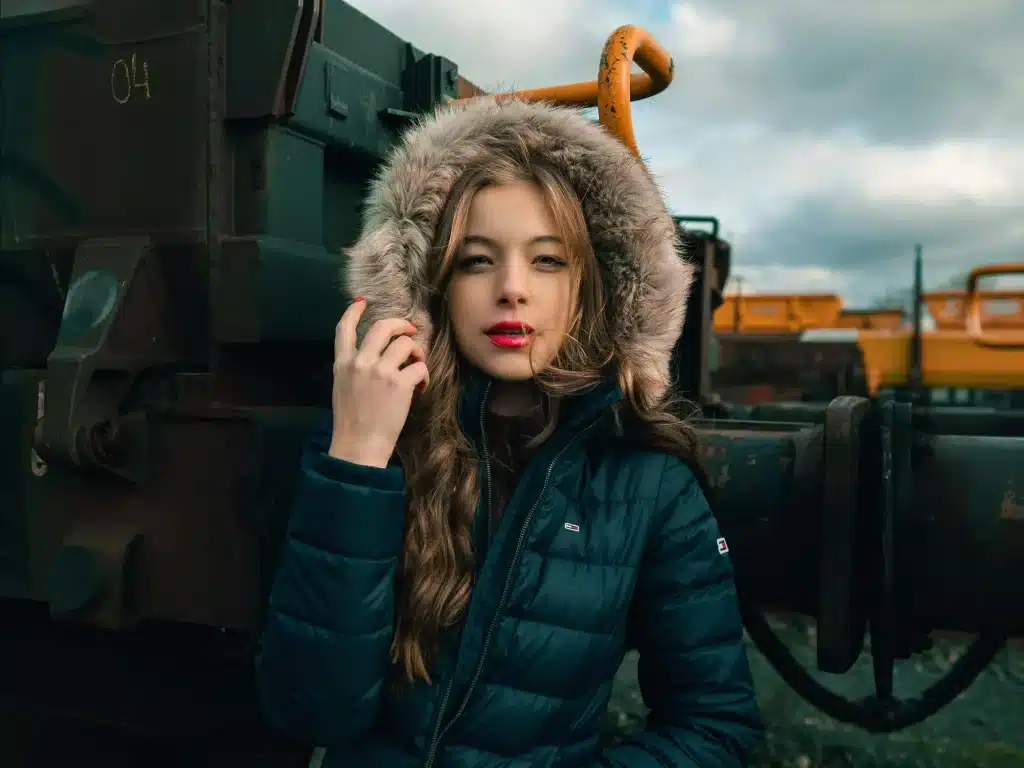 a woman wearing fur jacket